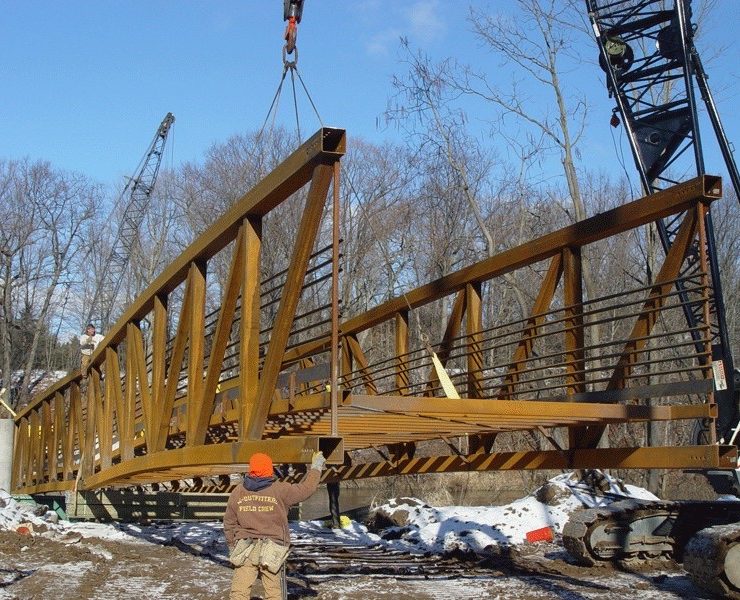 Prefabricated steel bridges offer exceptional strength and quick installation, making them ideal for marine crossings with limited construction windows. Their factory-built precision ensures corrosion resistance, durability, and reduced environmental disruption in coastal environments. Photo credit: Art Thureson Inc