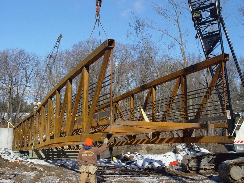 Prefabricated steel bridges offer exceptional strength and quick installation, making them ideal for marine crossings with limited construction windows. Their factory-built precision ensures corrosion resistance, durability, and reduced environmental disruption in coastal environments. Photo credit: Art Thureson Inc
