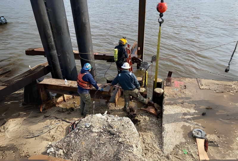 Underwater construction involves the placement, inspection, and repair of submerged structures using specialized equipment and trained divers. This work is essential for maintaining the integrity of ports, bridges, and offshore foundations. Photo Credit: Walker Diving