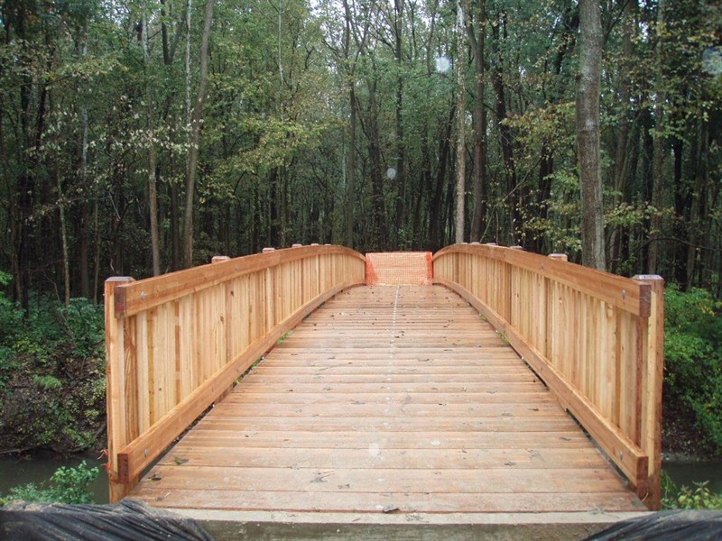 Prefabricated timber bridges offer fast, low-impact installation ideal for sensitive marine environments. Engineered timber provides strength, sustainability, and natural resistance to moisture and corrosion in coastal settings. Photo credit: Art Thureson Inc