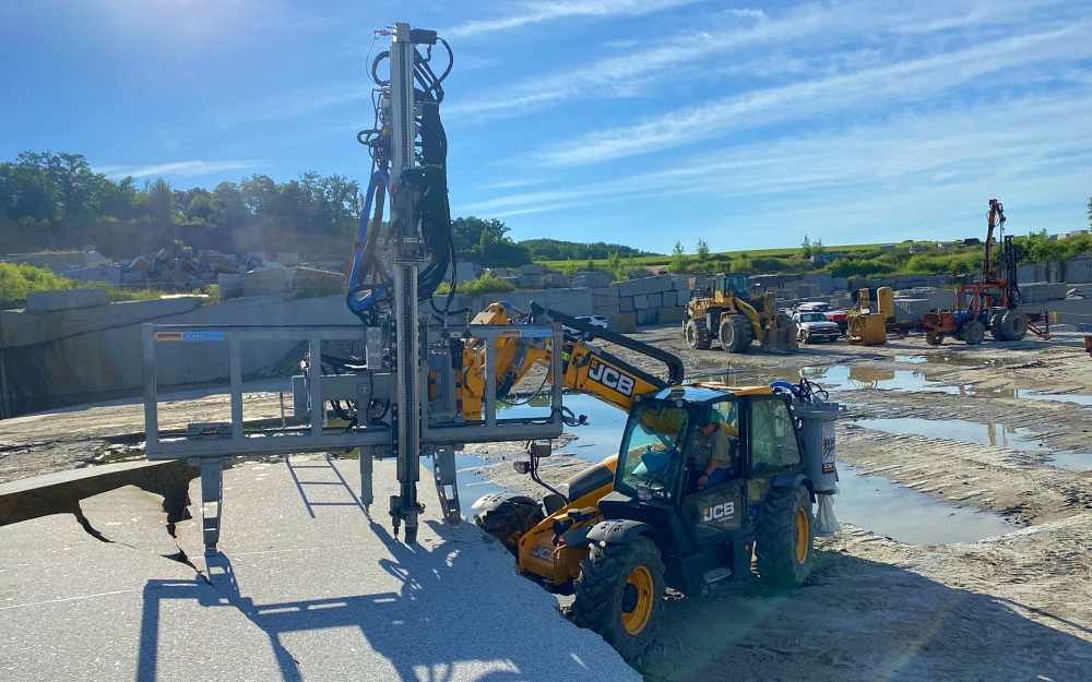 Modern attachments offer 360 degree mast rotation that improves precision when drilling near obstacles or along tight jobsite boundaries. This flexibility reduces the need for machine repositioning and speeds up installation. Photo Credit: WORD Rock Drills