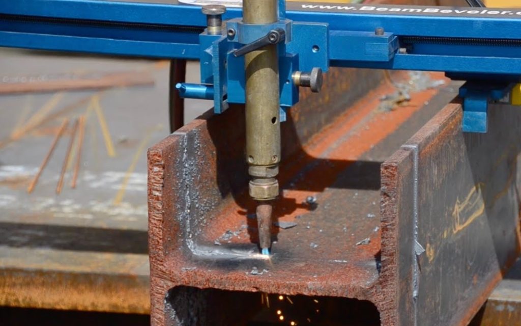 Beam beveling is a fabrication process that shapes the edges of steel beams and plates to achieve precise welding angles, ensuring stronger, cleaner, and more reliable joints in structural assemblies. In marine and heavy construction, it minimizes weld stress and improves corrosion protection at connection points. Photo Credit: Beam Beveler