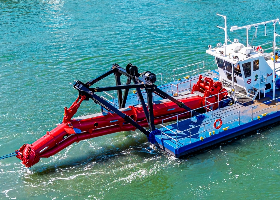 Many infrastructure projects pair dredging with foundation engineering to maintain channel geometry throughout construction. This integrated approach helps prevent scour and preserves stability around installed piles. Photo Credit: Ellicott Dredges, LLC