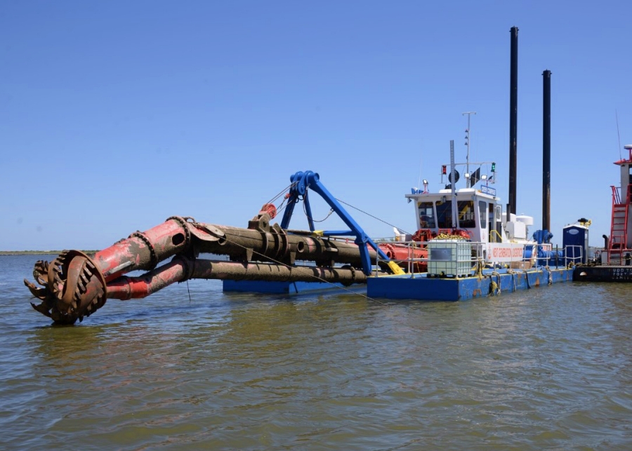 Clearing sediment before pile installation exposes true riverbed conditions and reduces the risk of driving piles into unknown debris. This improves accuracy, safety and long term structural performance. Photo Credit: Ellicott Dredges, LLC