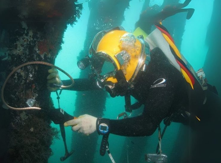 Commercial diving teams provide critical support during marine construction, ensuring underwater installations are properly aligned, anchored, and inspected. Their expertise keeps marine infrastructure stable and safe even in challenging underwater conditions. Photo Credit: Walker Diving