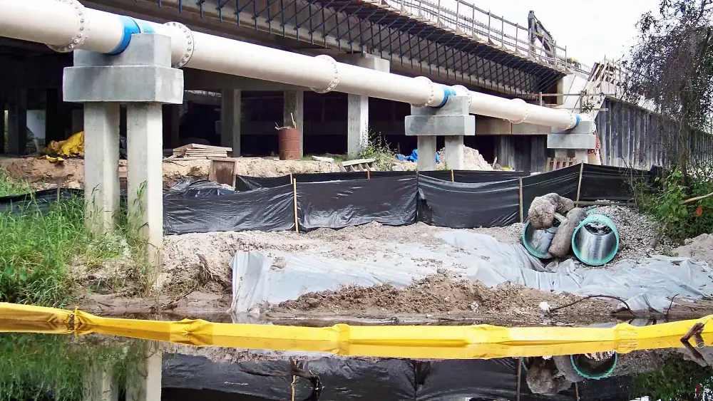 Most environmental permits for marine piling projects require turbidity monitoring and sediment control measures. Floating barriers are widely accepted because they provide visible and measurable water quality protection. Photo Credit: Enviro-USA American Manufacturer, LLC