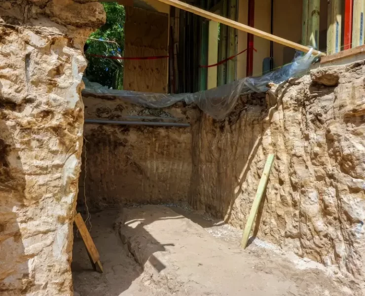 Permeation grouting strengthens soil by filling existing pore spaces with low-viscosity grout without disturbing the soil structure. This makes it ideal for stabilizing sands and gravels beneath deep foundations and existing structures. Photo Credit: TerraGrout