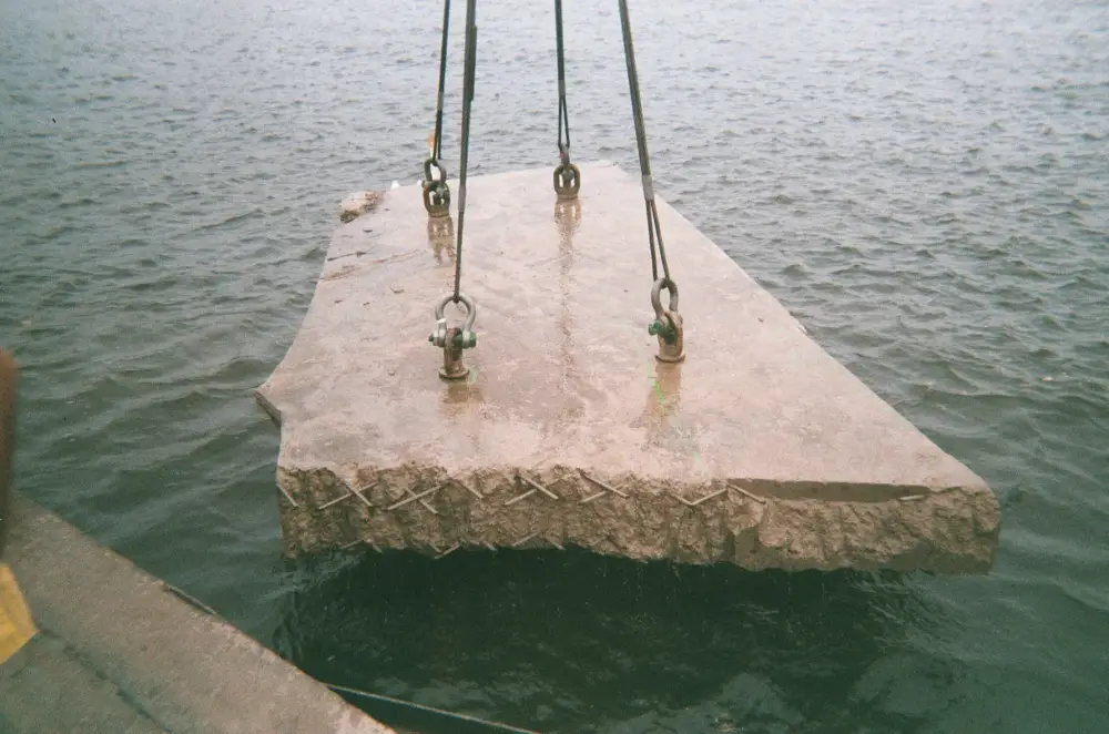 Heavily reinforced marine structures such as piers, caissons, and bridge foundations can be segmented precisely using wire sawing. The technique supports safer lifting, cleaner separation, and improved environmental control during removal. Photo Credit: Cutting Technologies, Inc.
