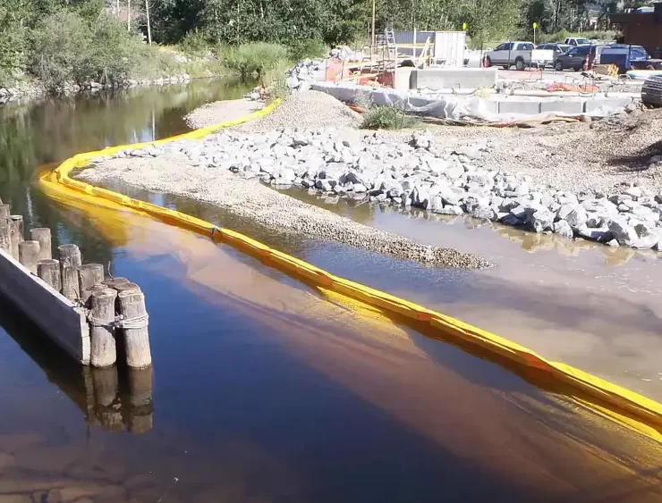 Floating turbidity barriers are used to contain suspended sediments released during pile driving and seabed disturbance. They help prevent sediment from spreading beyond the active marine construction zone. Photo Credit: Enviro-USA American Manufacturer, LLC