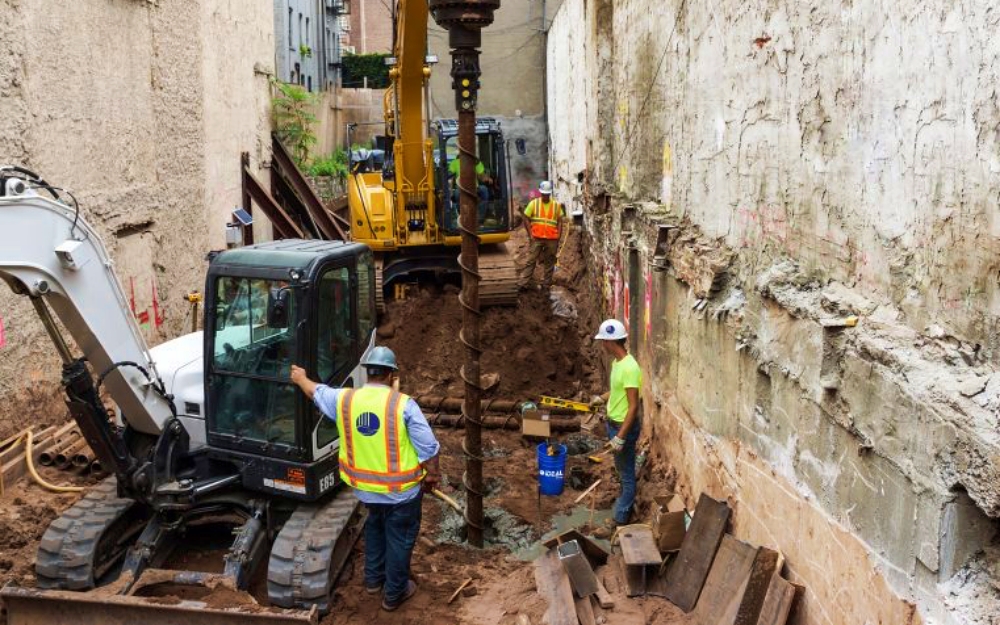 Helical anchors are designed to resist tension by transferring load through helix plates into stable soil layers. Their predictable torque to capacity relationship allows contractors to verify anchor performance instantly during installation, which makes them reliable for temporary and permanent tension applications. Photo Credit: Danbro Distributors