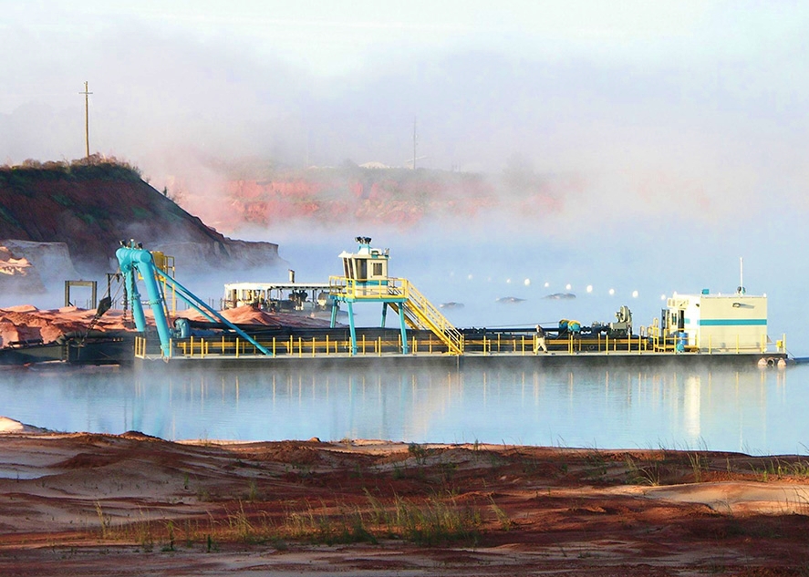 Dredged material can be reused as structural or working platform fill when grain size, moisture content, and contamination levels meet project and regulatory requirements. Proper processing helps reduce disposal volumes and material import costs. Photo Credit: DSC Dredge, LLC