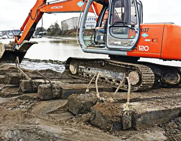 Properly specified construction timber helps distribute heavy equipment loads, reducing ground pressure and improving stability on temporary access routes. This function is especially critical on soft soils and marine construction sites. Photo Credit: CarlWood Lumber Limited