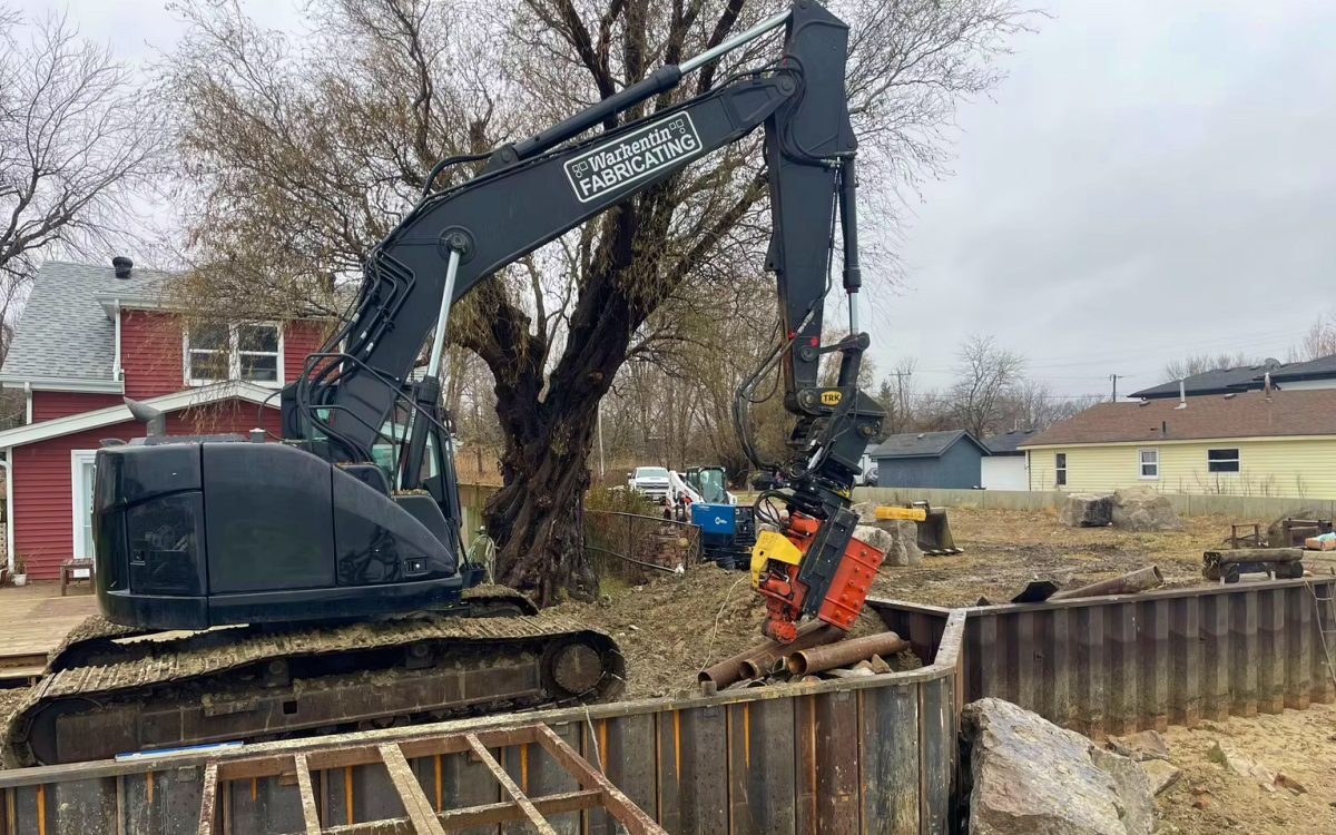 Unlike rigid concrete walls, hybrid systems can better tolerate minor soil movement and shoreline settlement without losing stability. This makes them more adaptable in changing coastal and lakefront environments. Photo Credit: Warkentin Fabricating
