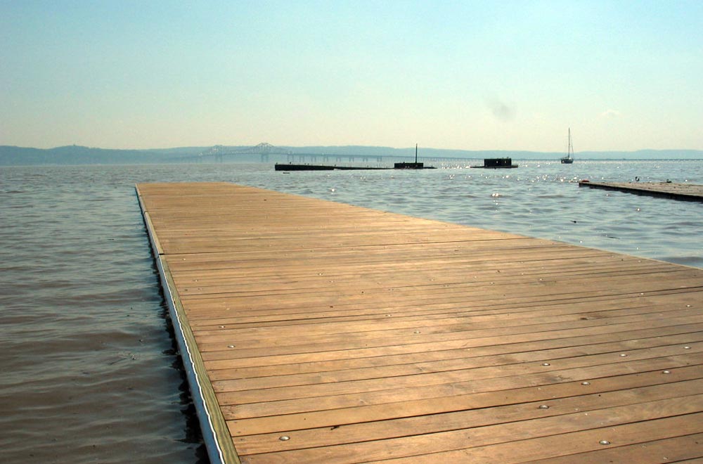 Aging docks often experience structural degradation due to repeated exposure to wave loading, salinity, and UV radiation over decades of service. Regular inspections help identify early signs of corrosion, rot, or connection failure before they affect load capacity. Photo Credit: Meeco Sullivan