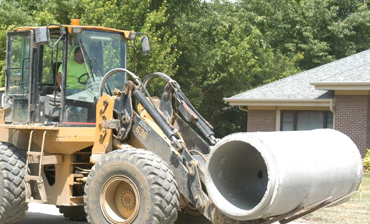 Subsurface drainage systems are often hidden from view, but they play a key role in stabilizing soils and protecting pile-supported infrastructure. Durable drainage components help control water movement in harsh marine environments where access for repairs is limited. Photo Credit: Scituate Concrete Products