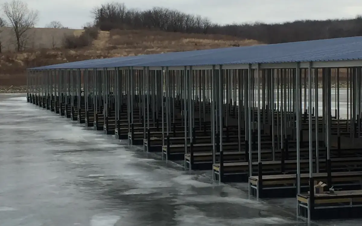 Fixed piers transfer both vertical and lateral loads directly into their foundations, making pile embedment depth and soil bearing capacity critical design factors. Poor subsurface conditions can significantly increase construction cost and risk for fixed pier systems. Photo Credit: Pier Genius