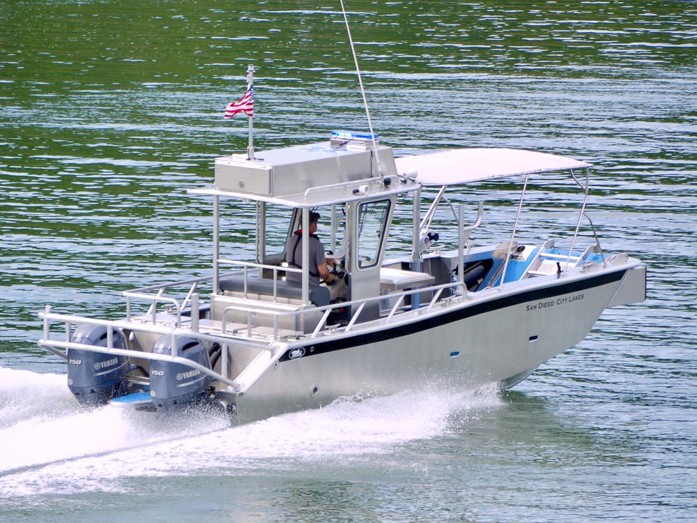 Underwater piling inspections often rely on diver based visual surveys supported by vessels equipped with open work decks and safe entry points. These inspections help identify corrosion, decay, marine growth, and structural damage that cannot be seen from above water. Photo Credit: Munson Boats