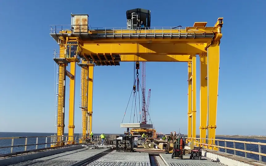 Coastal and marine structures are highly exposed to chloride intrusion from seawater and salt-laden air. Properly detailed steel reinforcement helps limit crack widths and slows the progression of corrosion in reinforced concrete. Photo Credit: D.T. Read Steel