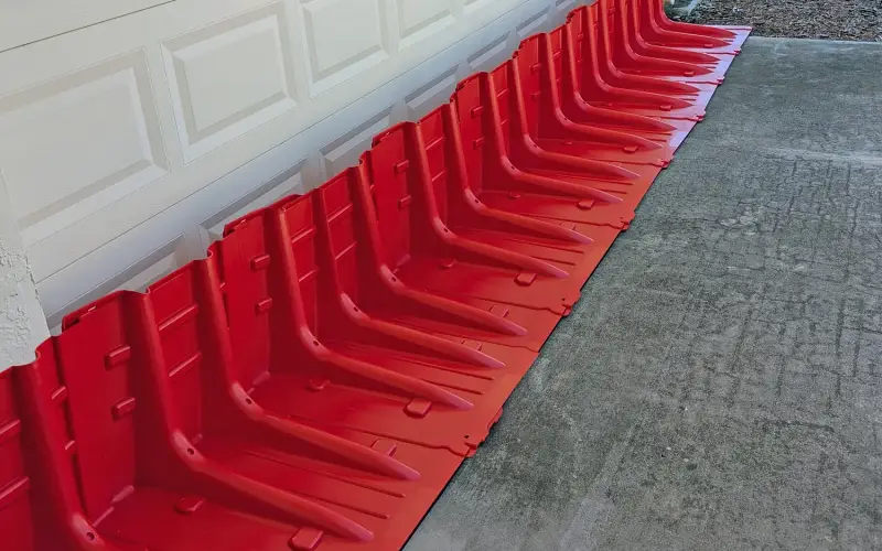 Floodwater intrusion can compromise pile alignment, soil stability, and installation accuracy if not controlled early. Temporary barriers and dewatering measures reduce erosion and limit downtime during high-water events. Photo Credit: Garrison Systems, LLC