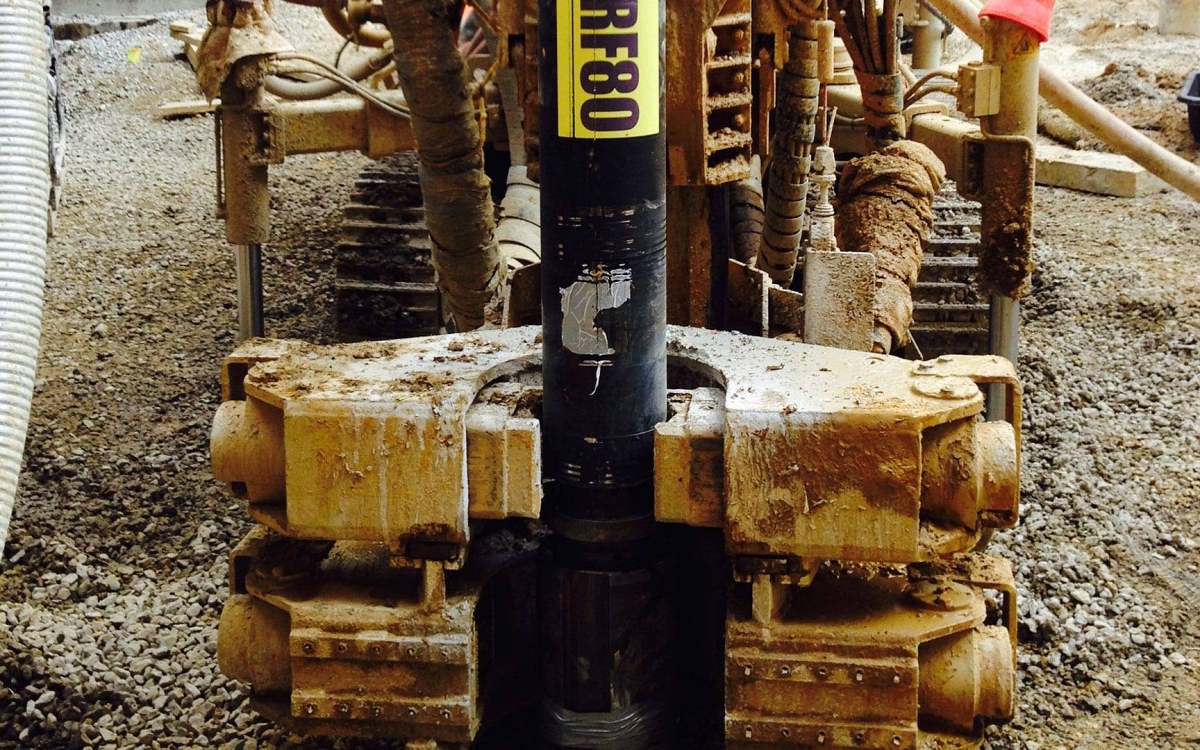 Soil-to-rock transitions often involve weathered or fractured rock rather than intact bedrock, creating uneven resistance across the borehole. This variability is a primary cause of early deviation during deep foundation drilling. Photo Credit: Center Rock, Inc.