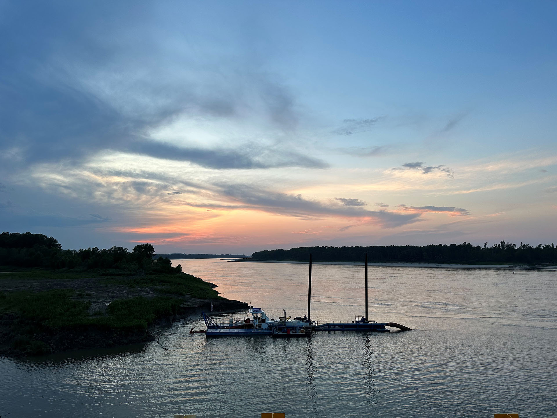 Disposal costs often consume more project budget than actual dredging excavation work. Contaminated sediments requiring lined landfill disposal cost substantially more per cubic yard than clean material suitable for beneficial reuse as fill. Photo Credit: Dredge America, Inc.