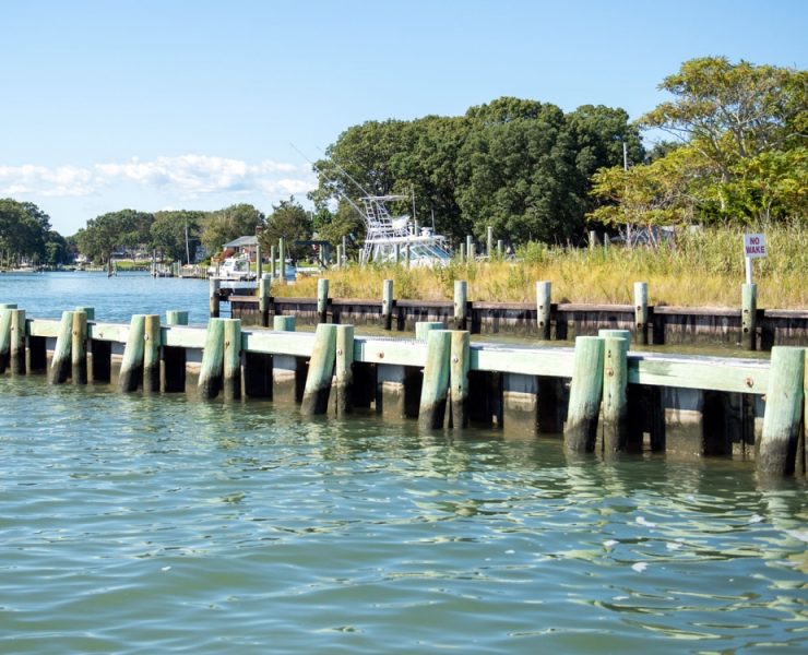 Pressure-treated lumber used in bulkheads and seawalls is treated to higher preservative retention levels than standard construction lumber to withstand constant moisture and ground contact. Using lower-grade treated wood in marine environments significantly reduces service life. Photo Credit: Port Lumber Corp