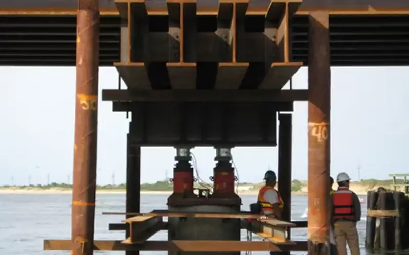 Accurate load and displacement data depend on stable reaction behavior throughout the test. Proper reaction system design is essential for reliable interpretation of pile capacity and settlement. Photo Credit: WB Equipment