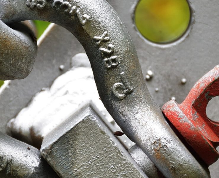 Load rotation often occurs when the center of gravity does not align with the lifting connection, causing torsional forces to develop once the load is airborne. These forces are amplified in marine environments due to wind, vessel movement, and limited tag line control. Photo Credit: Bishop Lifting