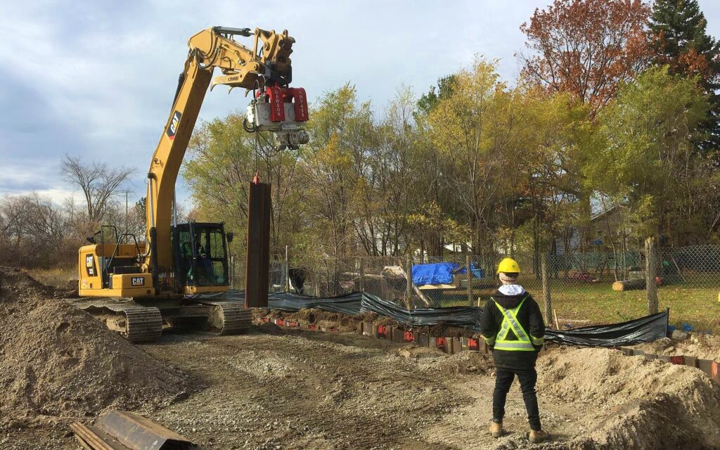 Tremie grouting is commonly used to seal interlocks because it allows grout placement from the bottom upward, minimizing voids and ensuring full joint contact. Proper material selection depends on groundwater chemistry and required permeability targets. Photo Credit: Waterloo Barrier