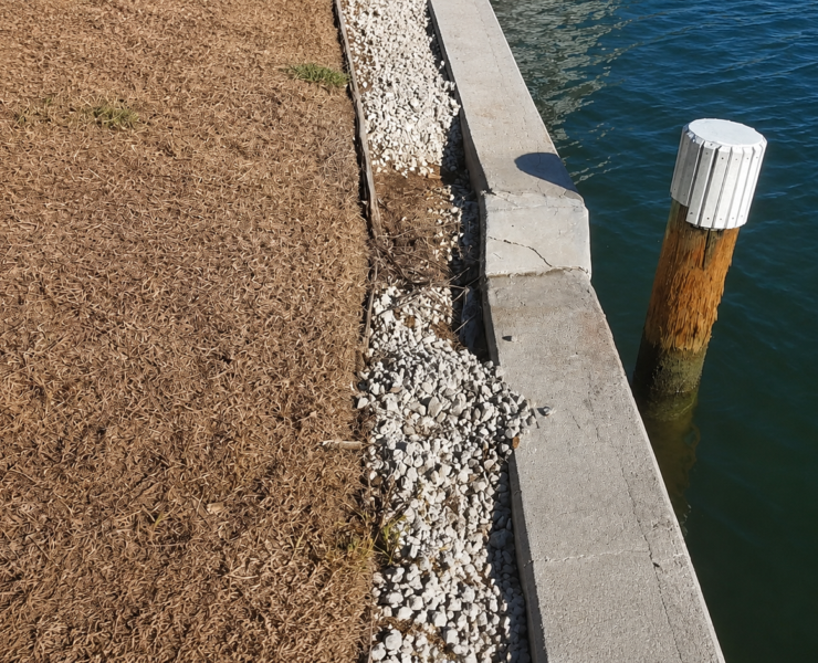 Dry weep holes after rainfall may indicate that the drainage system has become clogged. When water cannot escape, pressure continues to build behind the retaining wall. Photo Credit: JET Filter System, LLC