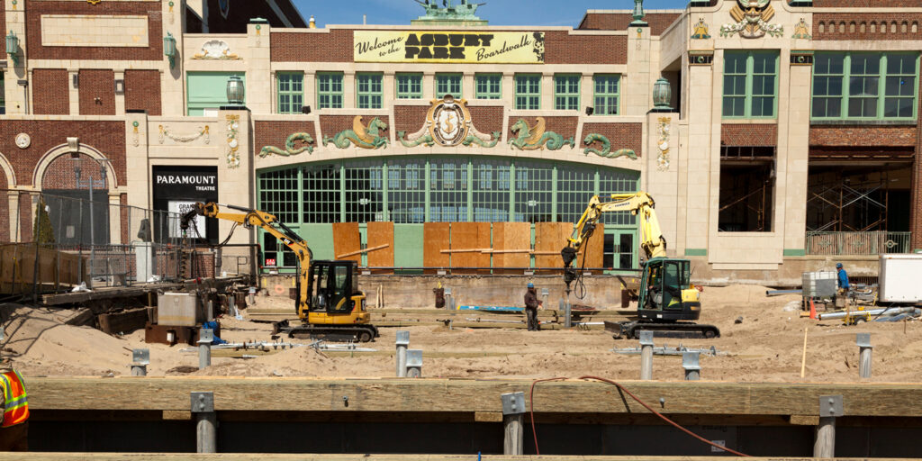 264 grout-filled helical piles installed with no vibration next to the existing bulkhead and storefronts. Installing contractor: South Jersey Helical Piers. Photo Credit: Danbro Distributors